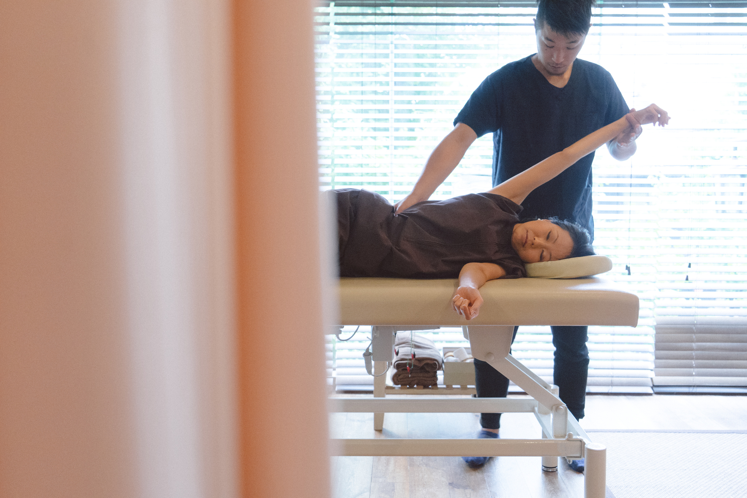 Patient receiving chiropractic treatment