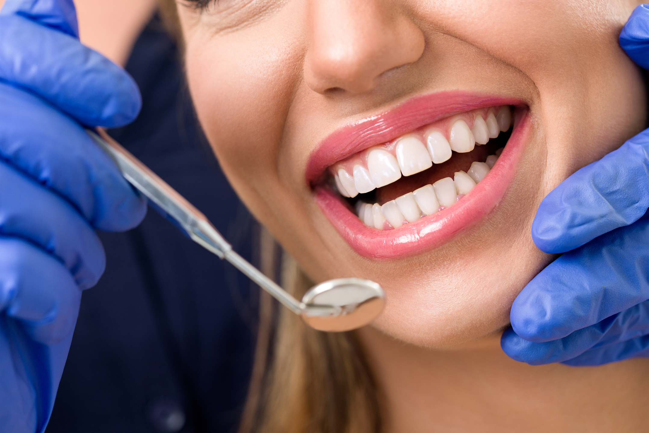 Smiling woman at dentist